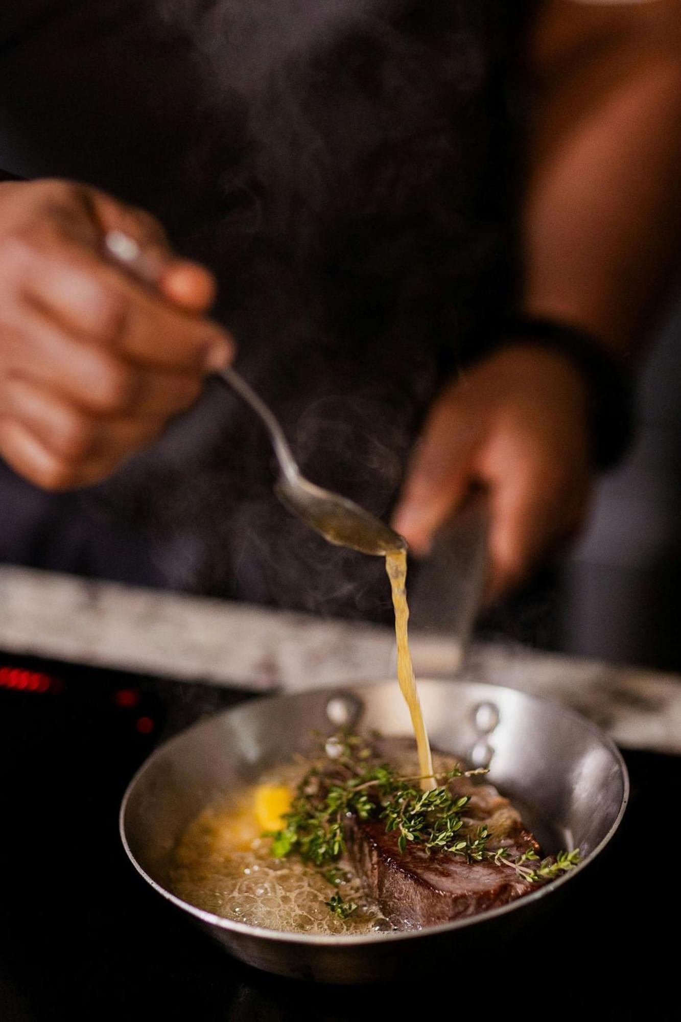 Stock Exchange Hotel Manchester Exterior foto A chef seasoning a dish